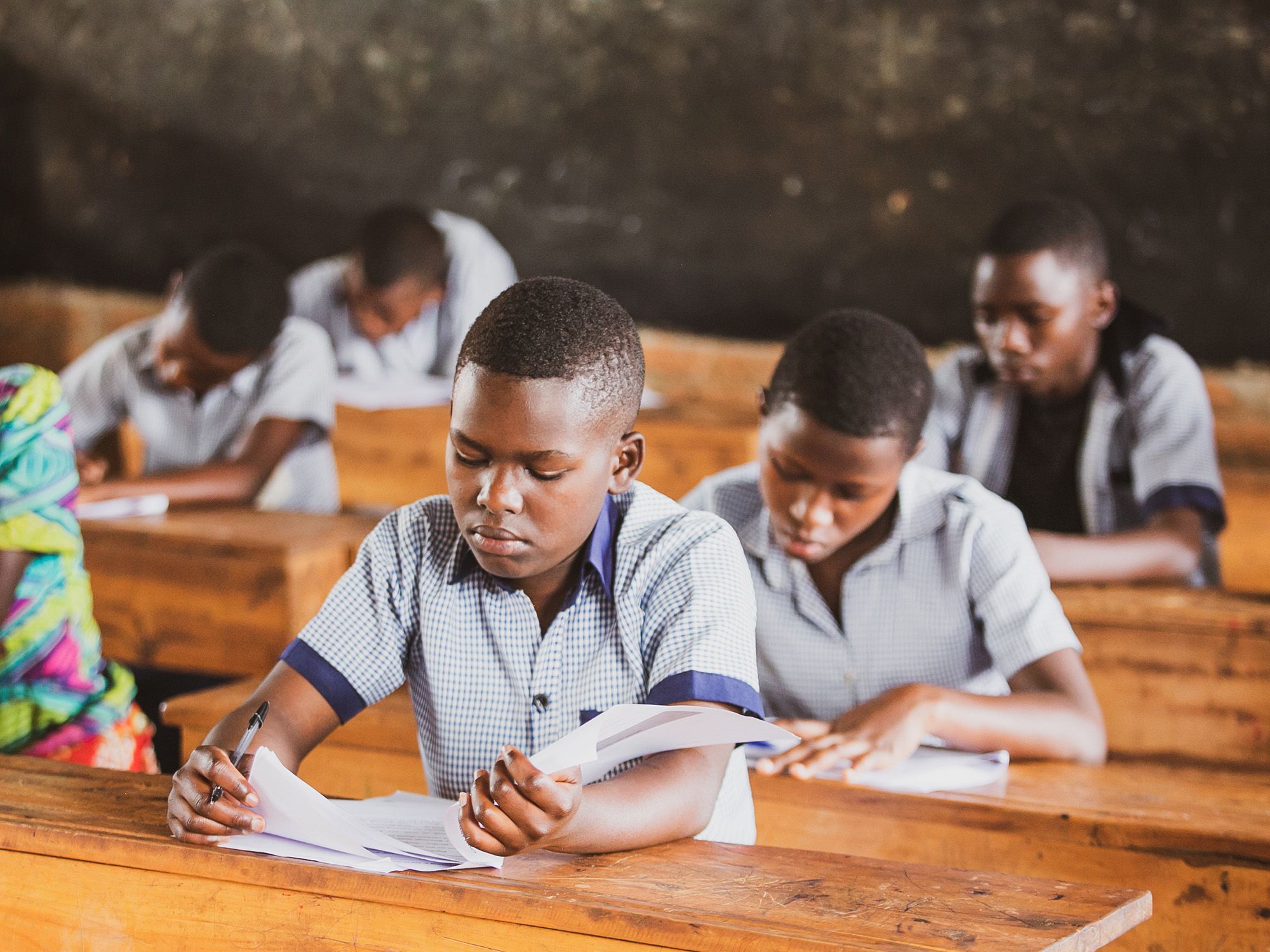 Students sit at their desks while taking a STARS learning assessment. © 2023 IPA / Timeless Studios